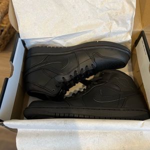 Black on black Air Jordan 1 Mid